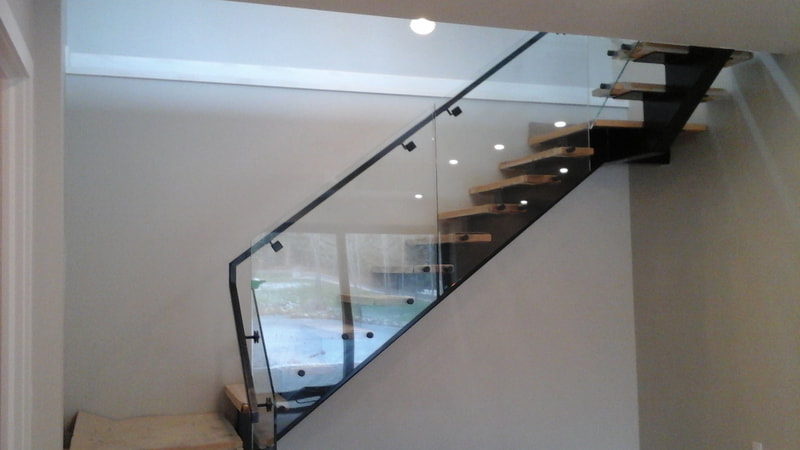 Iron stairs, steel stringers, floating stairs, saw tooth stair, single stringer stair