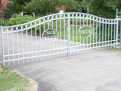 Driveway gate, iron gate, metal gate, custom gate, gate with logo
