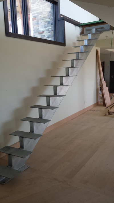 Iron stairs, steel stringers, floating stairs, single stringer stair